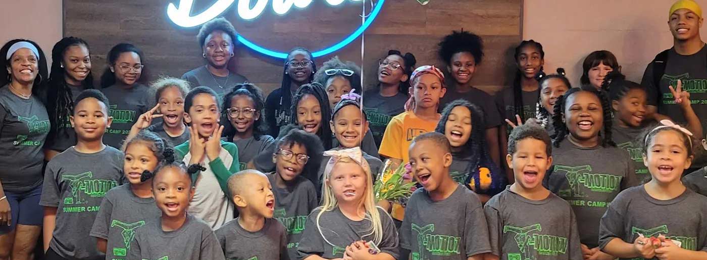 T-Motion Students in Black Shirts